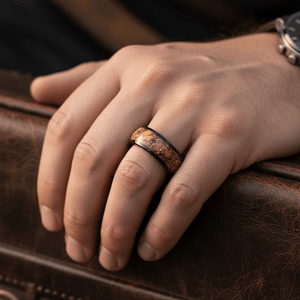 ERMIS — Lifestyle photo on hand — men's tungsten wedding ring.