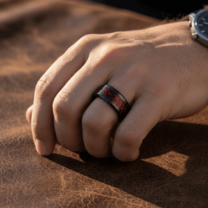 FIREFORGE — Lifestyle photo on hand — men's tungsten wedding ring.