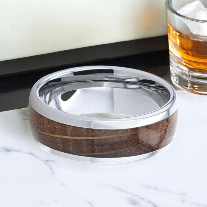 FORMENT tungsten ring with comfort fit design and rustic whiskey barrel wood inlay.