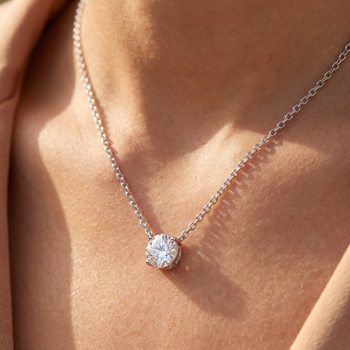 Four Prong Round Diamond Solitaire Necklace 925 silver lab grown diamond necklace being worn lifestyle photograph