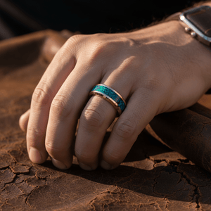 FUROR — Lifestyle photo on hand — men's tungsten wedding ring.