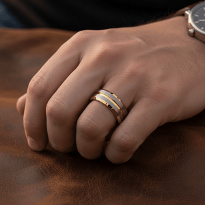 GLEAMLINE — Lifestyle photo on hand — men's tungsten wedding ring.