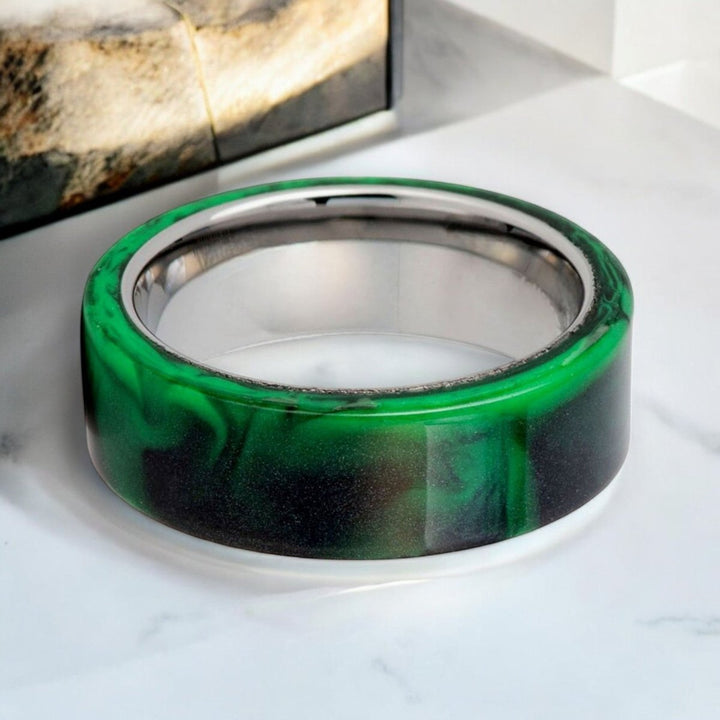 Close-up of GREENFIRE 8mm Tungsten Ring highlighting the black and green pattern.