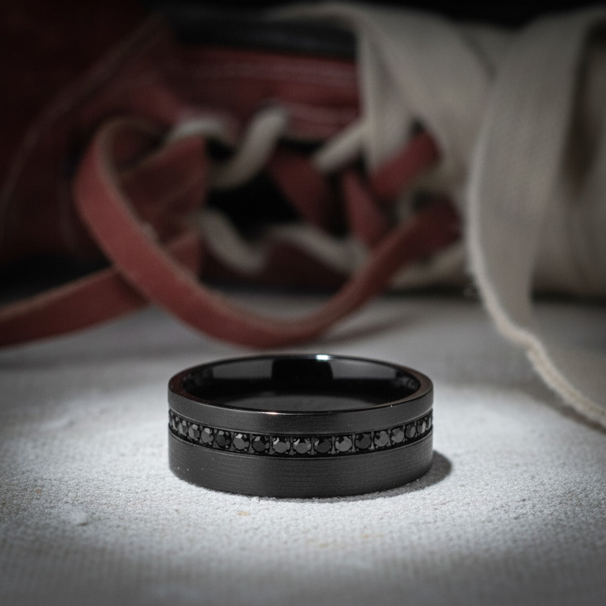 Aydins GROOVIX | Polished Black Tungsten Grooved Black CZ Wedding Ring 8mm lifestyle scene, boxing gym canvas