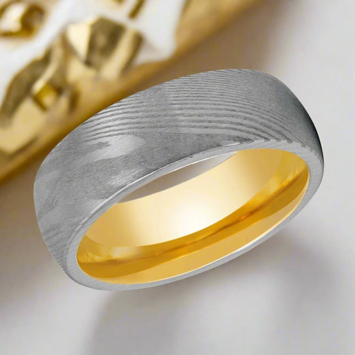 Side profile of the HELIOS ring showcasing the domed design and yellow tungsten interior