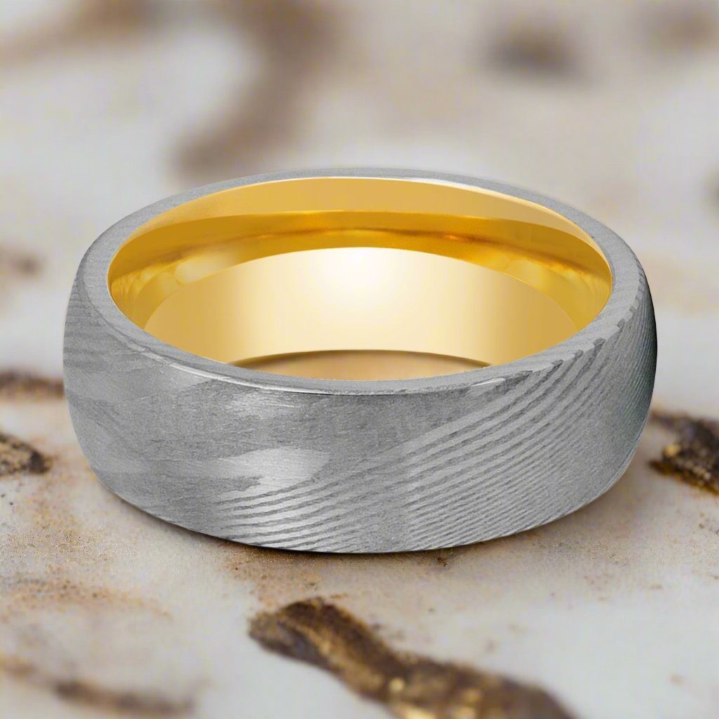 Unique wood grain pattern of the HELIOS Damascus Steel Ring by Aydins Jewelry