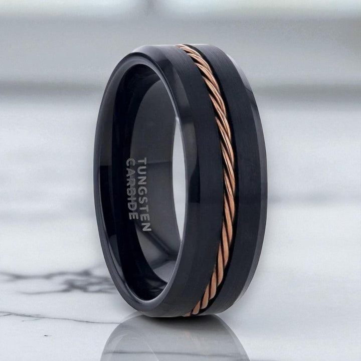 Side view of HORATIO black tungsten ring with rose gold braided center