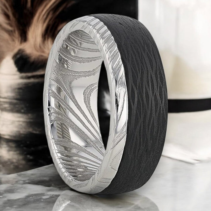 Men’s damascus steel wedding band with black wave carbon fiber inlay – Aydins Jewelry