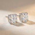 IGI certified lab-grown diamond stud earrings, cushion cut F+/VS+ 14k white gold, studio hero shot