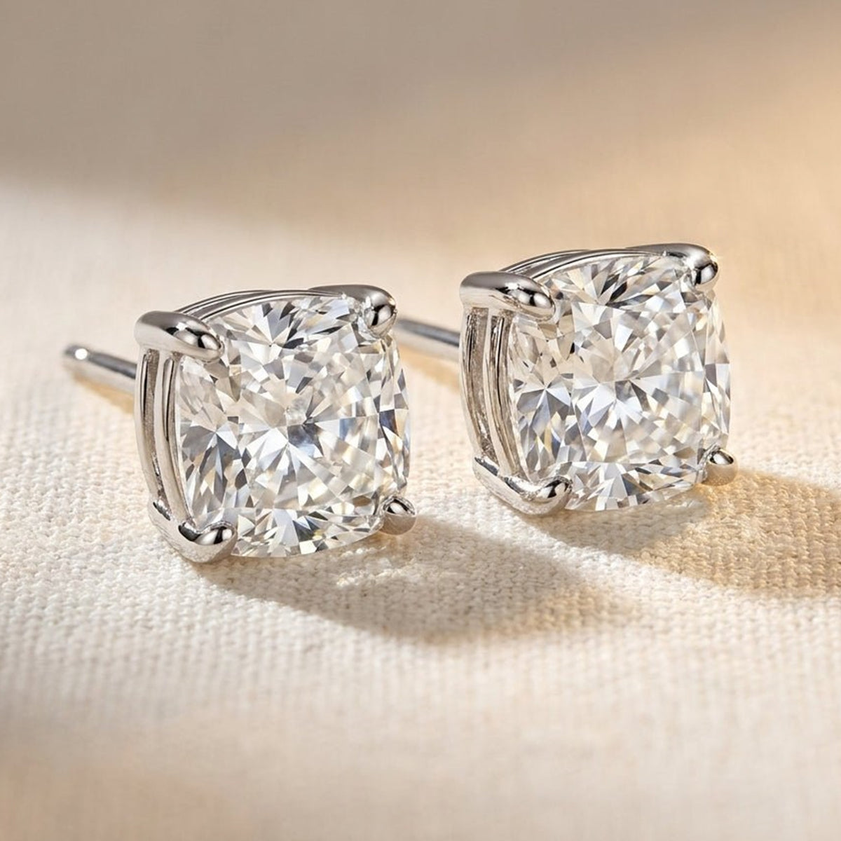 Cushion-cut lab-grown diamond stud earrings, studio hero photo