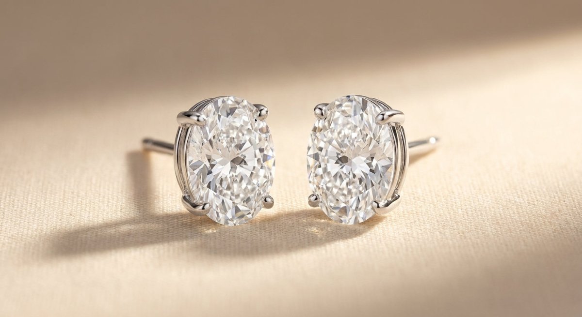 IGI certified lab-grown diamond stud earrings, oval F+/VS+ 14k white gold, studio hero shot
