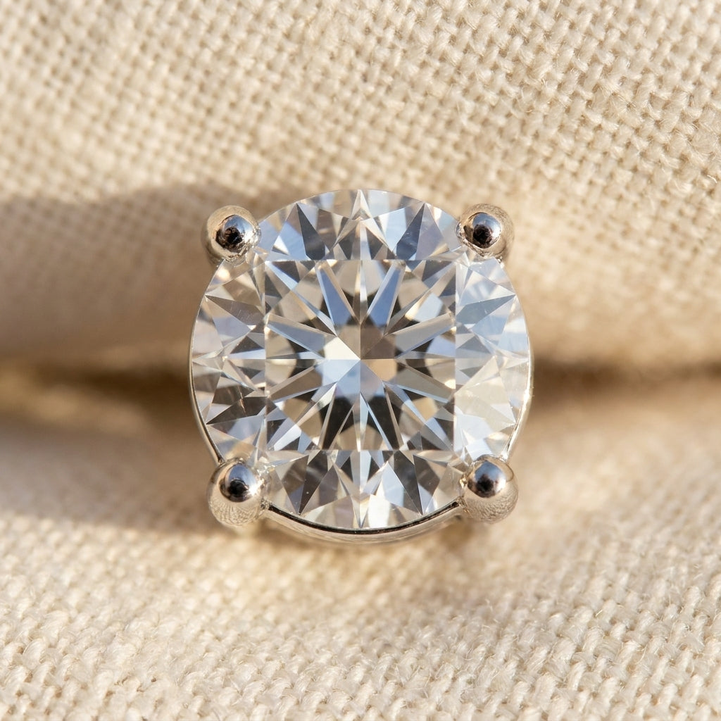 IGI certified lab-grown diamond stud earrings round brilliant, macro detail overhead flat lay