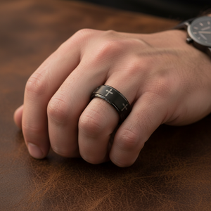 Man wearing IRONLANCE black tungsten cross wedding ring 8mm on ring finger