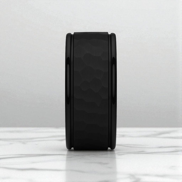 Angled view of JOINER ring showing contrast and texture