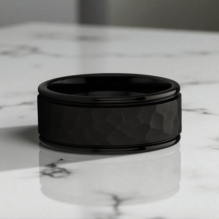 Interior comfort fit of hammered black tungsten ring