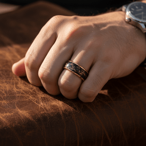 JOVIAN — Lifestyle photo on hand — men's tungsten wedding ring.
