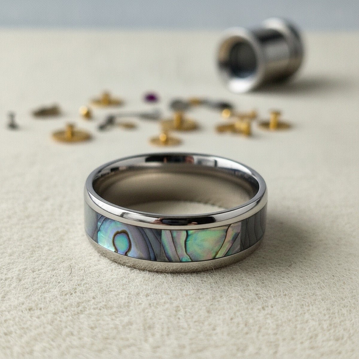 Aydins KAUI | Titanium Ring Pearl Inlay lifestyle scene, watchmaker bench
