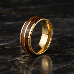 KOAFLARE — Luxury 3/4 angle on dark marble — men's tungsten wedding ring.