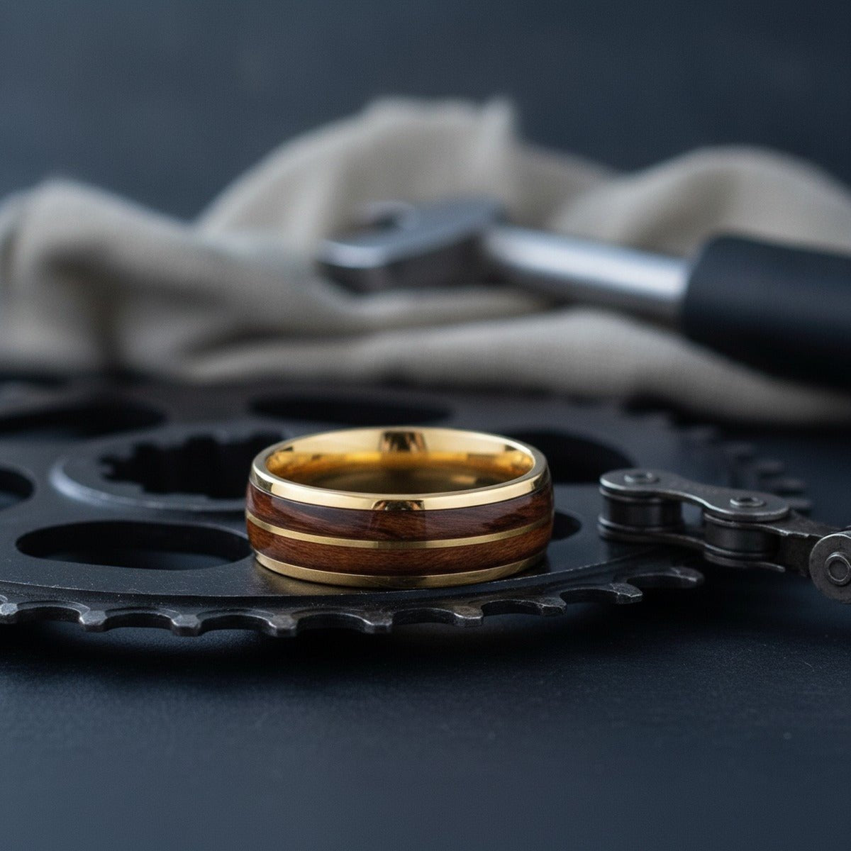 Aydins KOAFLARE | Tungsten Koa Wood Inlay Ring 8mm lifestyle scene, cycling workshop