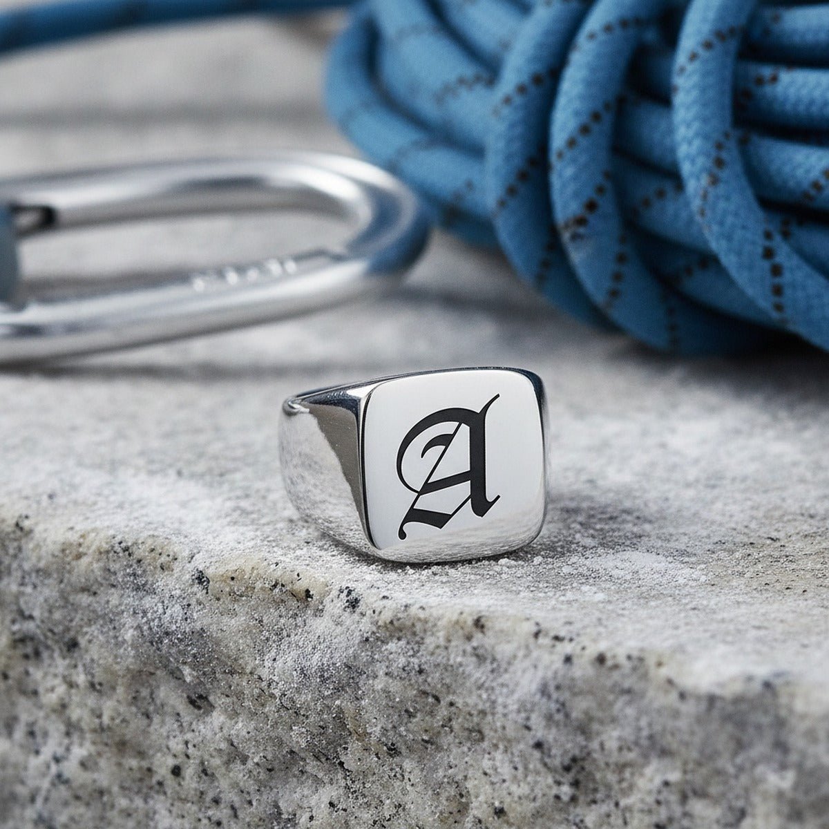 Aydins Laser Engraved Signet Ring Silver with Initial or Custom Logo lifestyle scene, climbing chalk