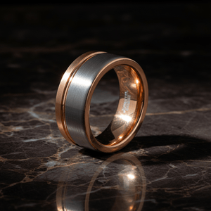 LEONEL — Luxury 3/4 angle on dark marble — men's tungsten wedding ring.