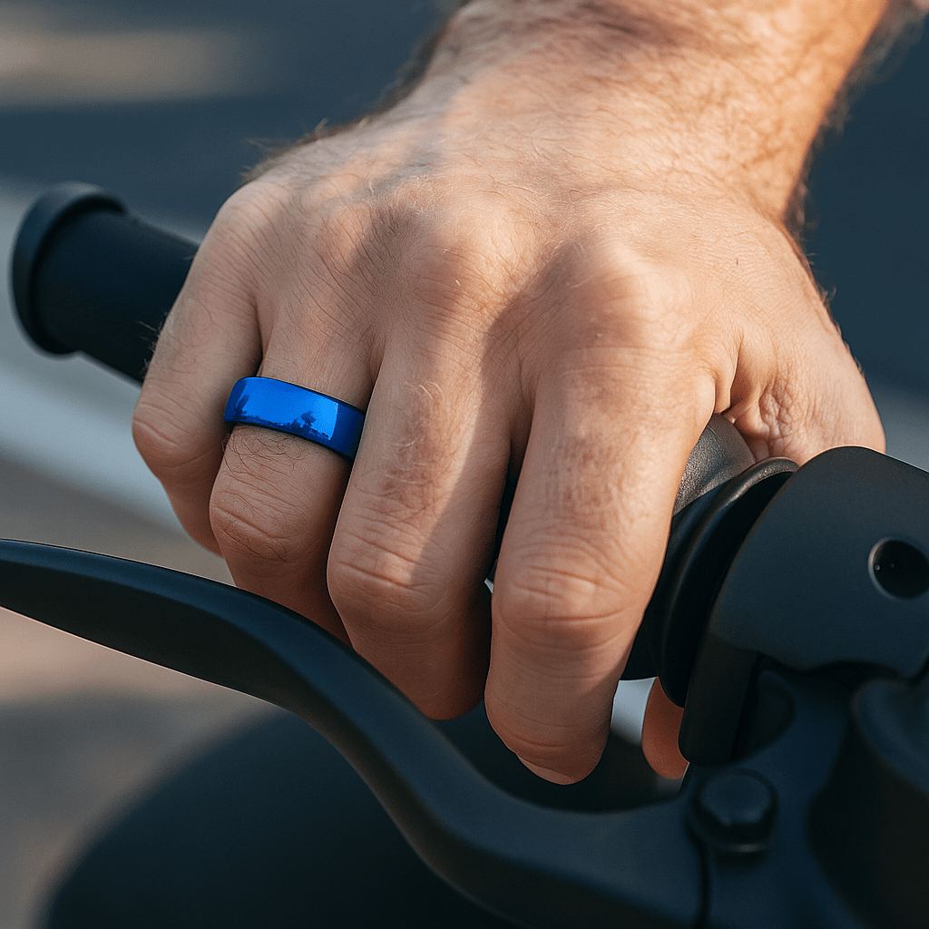 Close-up of domed surface on blue tungsten ring on Hand