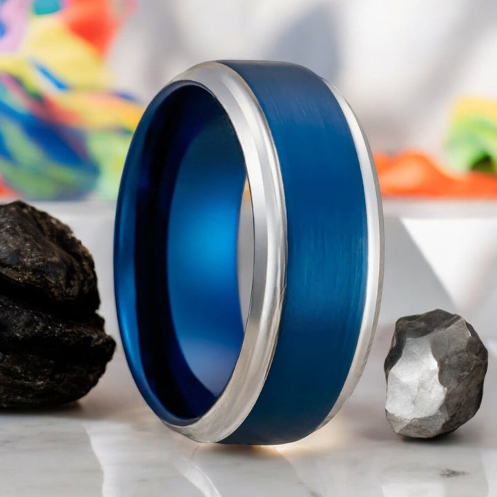 LINARD blue tungsten ring with brushed finish and silver stepped edge - front view.