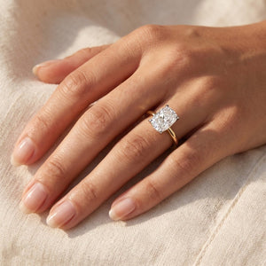 LOUISA elongated cushion lab-grown diamond ring in 10K two-tone gold, worn on the hand, approx. 1 ct center