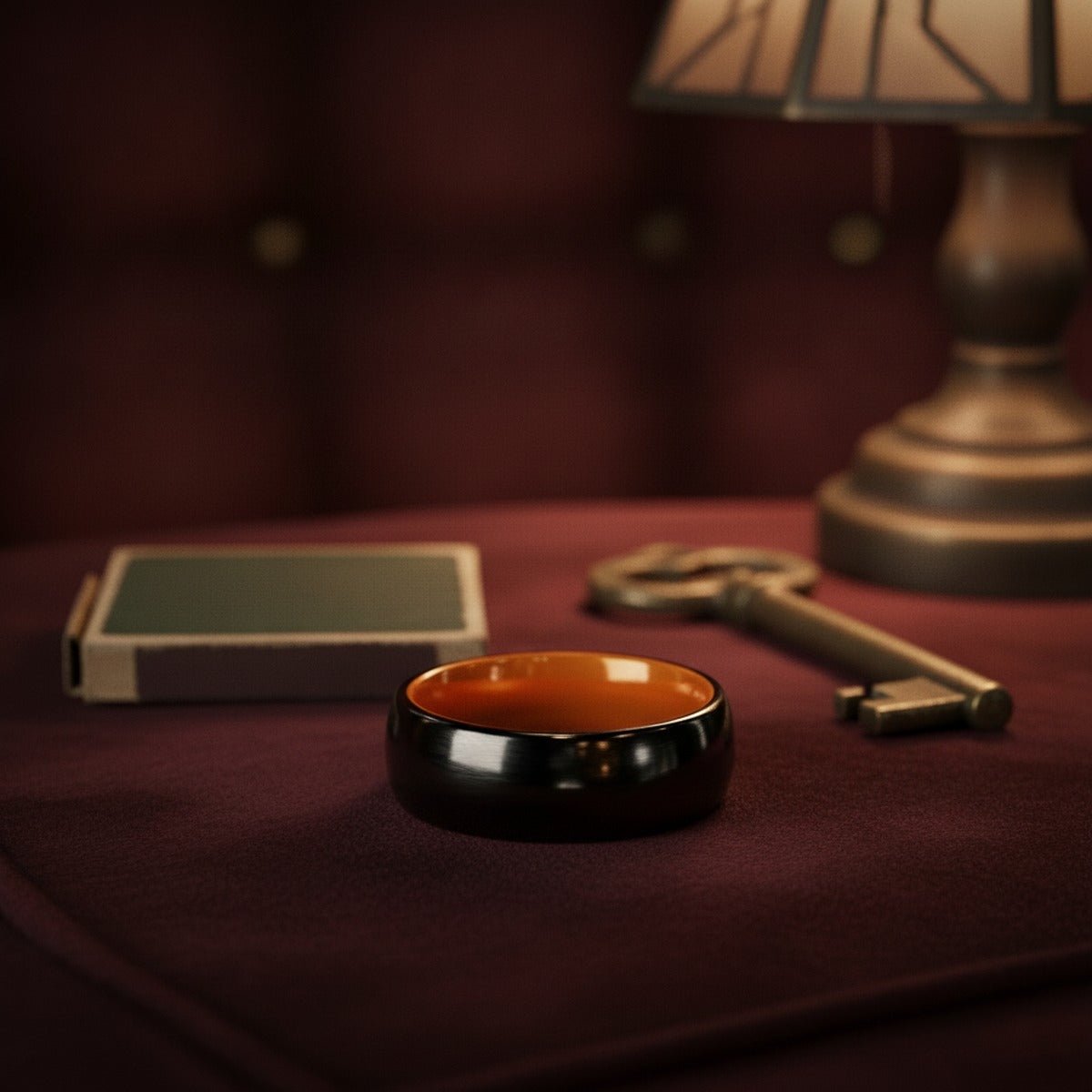 Aydins LYKAN | Orange Ring, Black Tungsten Ring, Shiny, Domed lifestyle scene, speakeasy velvet