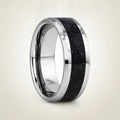 MAKI polished silver tungsten wedding band with sparkling purple goldstone inlay running around the band and polished beveled edges, studio hero shot