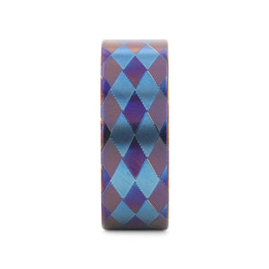 MERIDIAN flat titanium ring with anodized purple and blue diamond pattern, front view