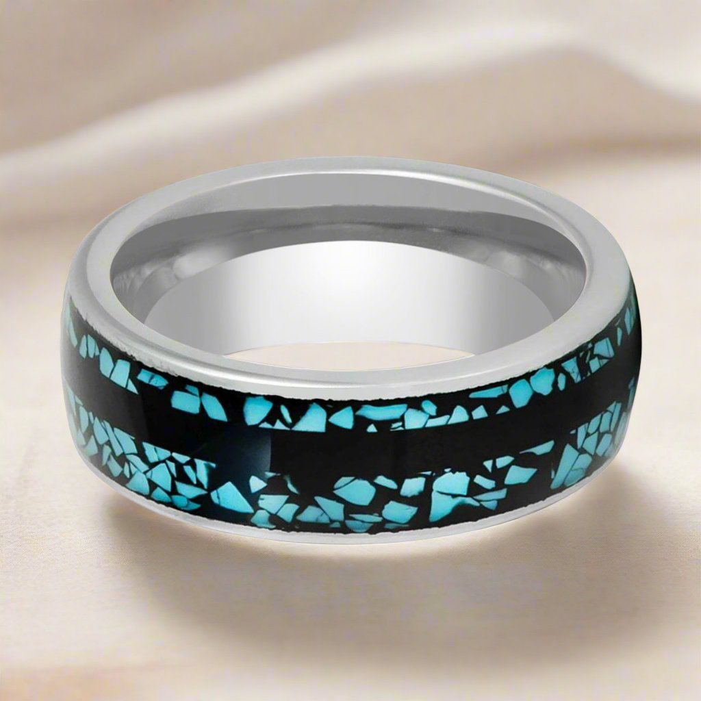 Close-up of MOSAIC tungsten ring’s turquoise fragments inlay and sleek black strip