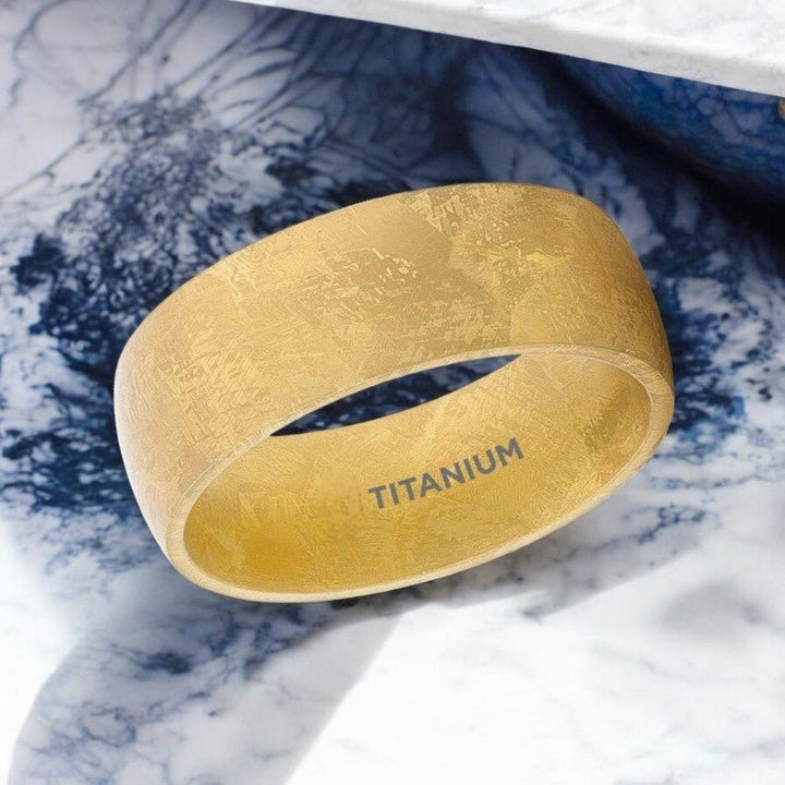 MYSTIC gold titanium wedding band featuring a unique meteorite-inspired texture - Aydins Jewelry.