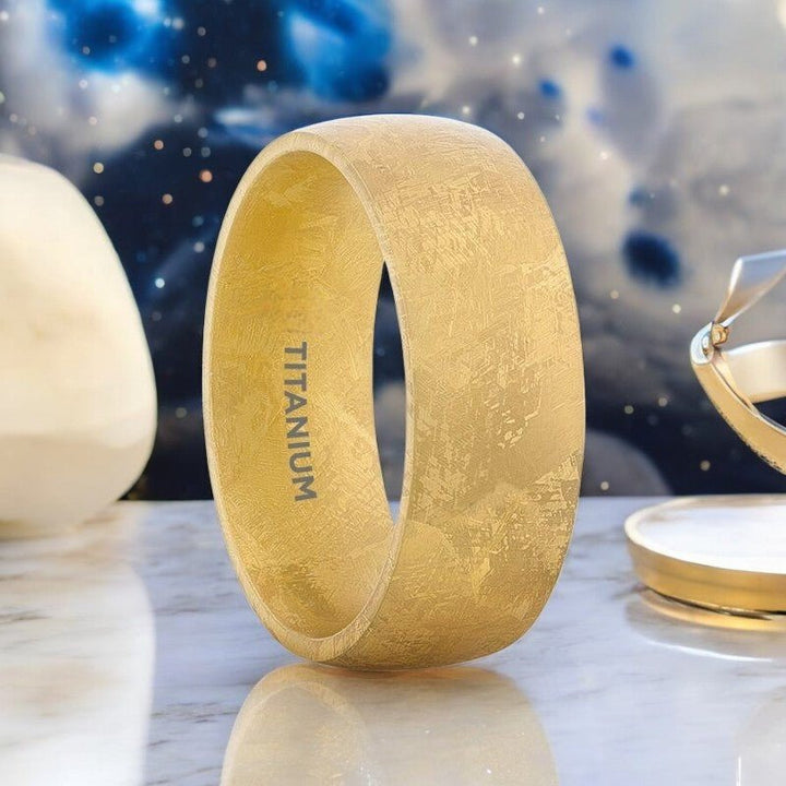 Gold titanium ring with meteorite pattern, domed design, and 8mm width - Aydins Jewelry.