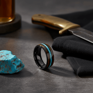 NETARTS — Editorial masculine still life — men's tungsten wedding ring.