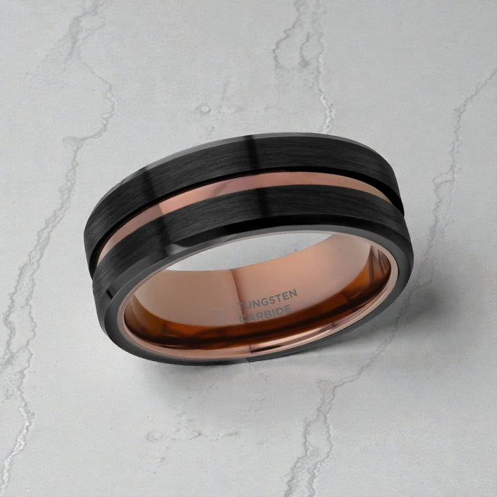 Side view of black tungsten wedding band with espresso center groove