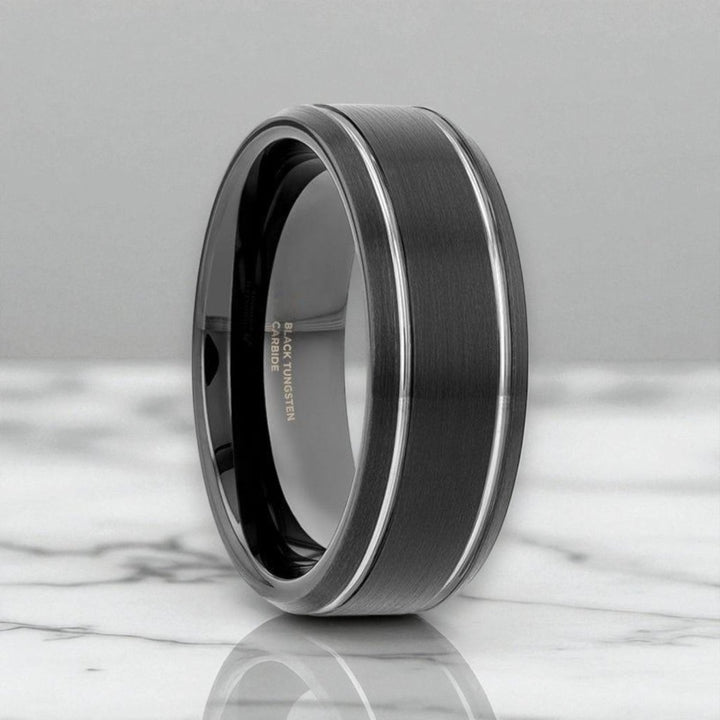 NOCTURNE black tungsten ring front view with polished grooves
