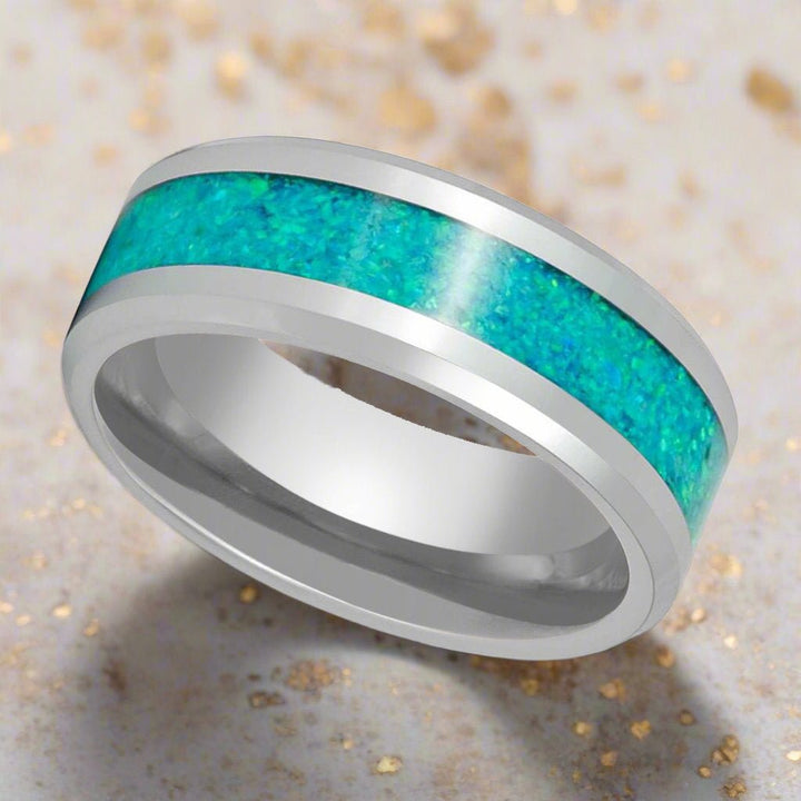 Side view of OCEARA ring showcasing polished beveled edges and vibrant kiwi green opal inlay