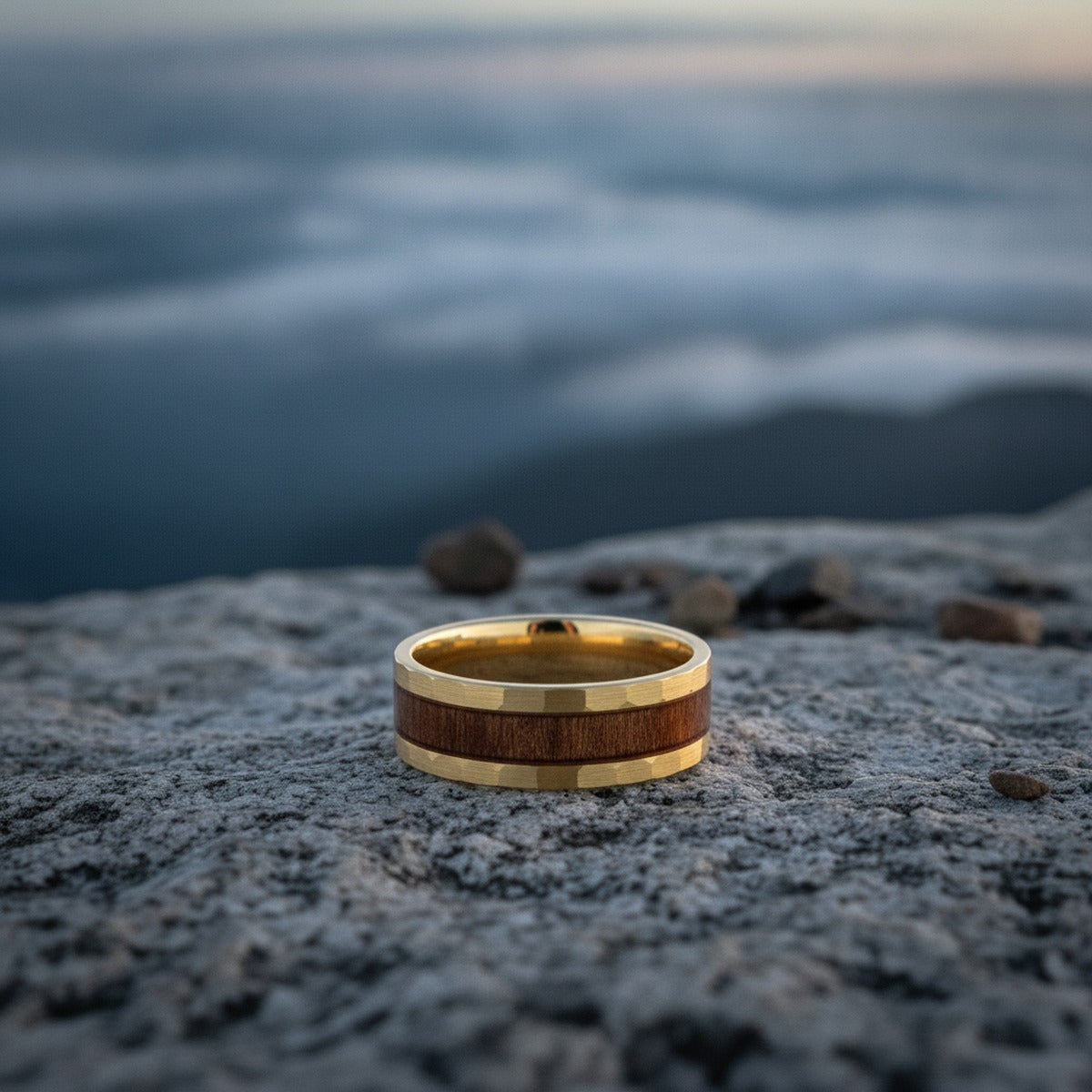 Aydins OCTANS | Tungsten Koa Wood Inlay Ring 8MM lifestyle scene, granite overlook