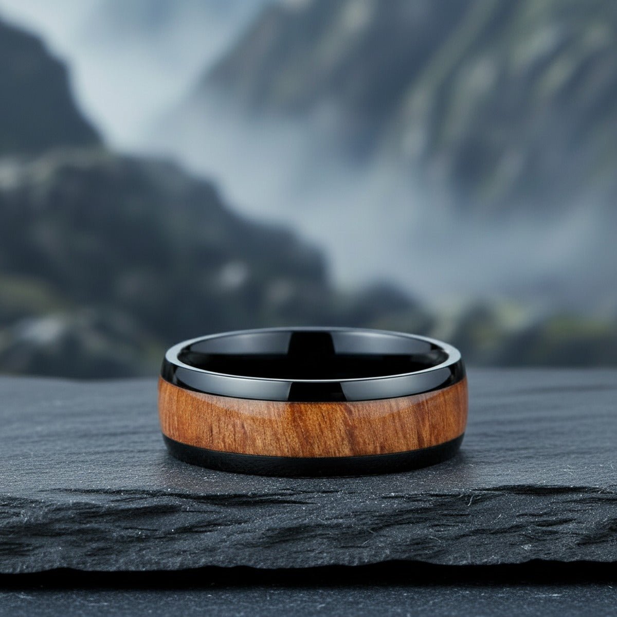Aydins ODYSSEY | Black Ceramic Ring, Carpathian Elm Wood Inlay lifestyle scene, slate stone mountain