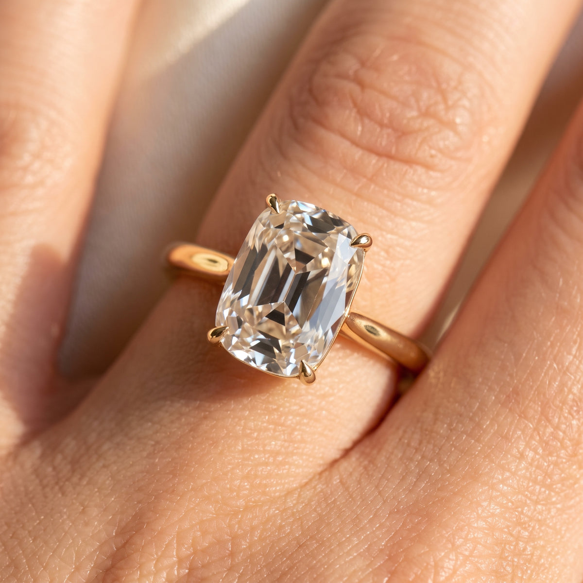 Old Mine elongated cushion lab-grown diamond solitaire engagement ring, Yellow Gold, on-finger