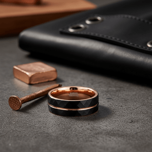 ORLANDO — Editorial masculine still life — men's tungsten wedding ring.