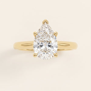 Pear lab-grown diamond solitaire engagement ring, Yellow Gold, face-on detail macro