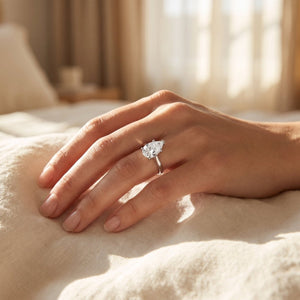 Pear lab-grown diamond solitaire engagement ring, White Gold, lifestyle photograph