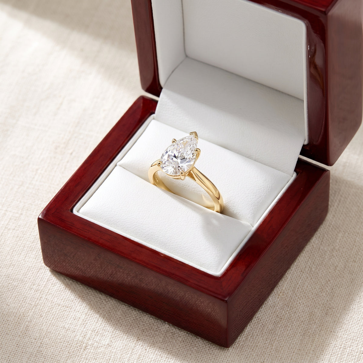 Pear lab-grown diamond solitaire engagement ring, Yellow Gold, in cherry-wood ring box
