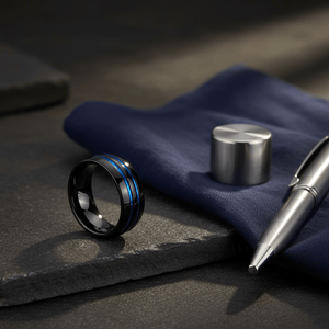 PETROS — Editorial masculine still life — men's tungsten wedding ring.
