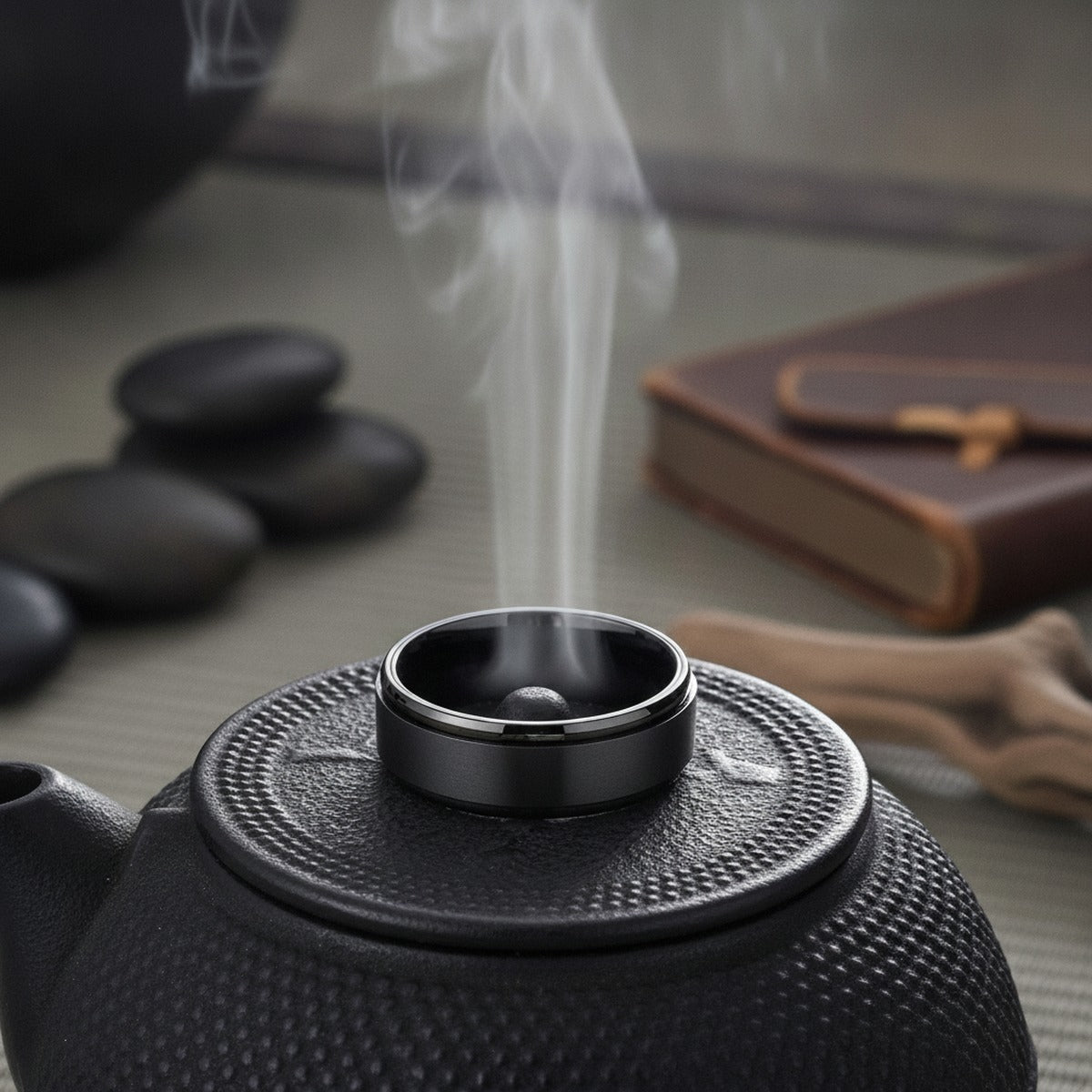 Aydins PHANTOM | Black Titanium Fidget Spinner Wedding Ring 8mm lifestyle scene, tea ceremony iron