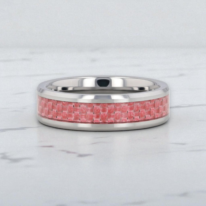Polished beveled edges with carbon fiber detail in PINK ring