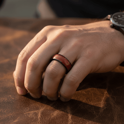 POTLATCH — Lifestyle photo on hand — men's tungsten wedding ring.