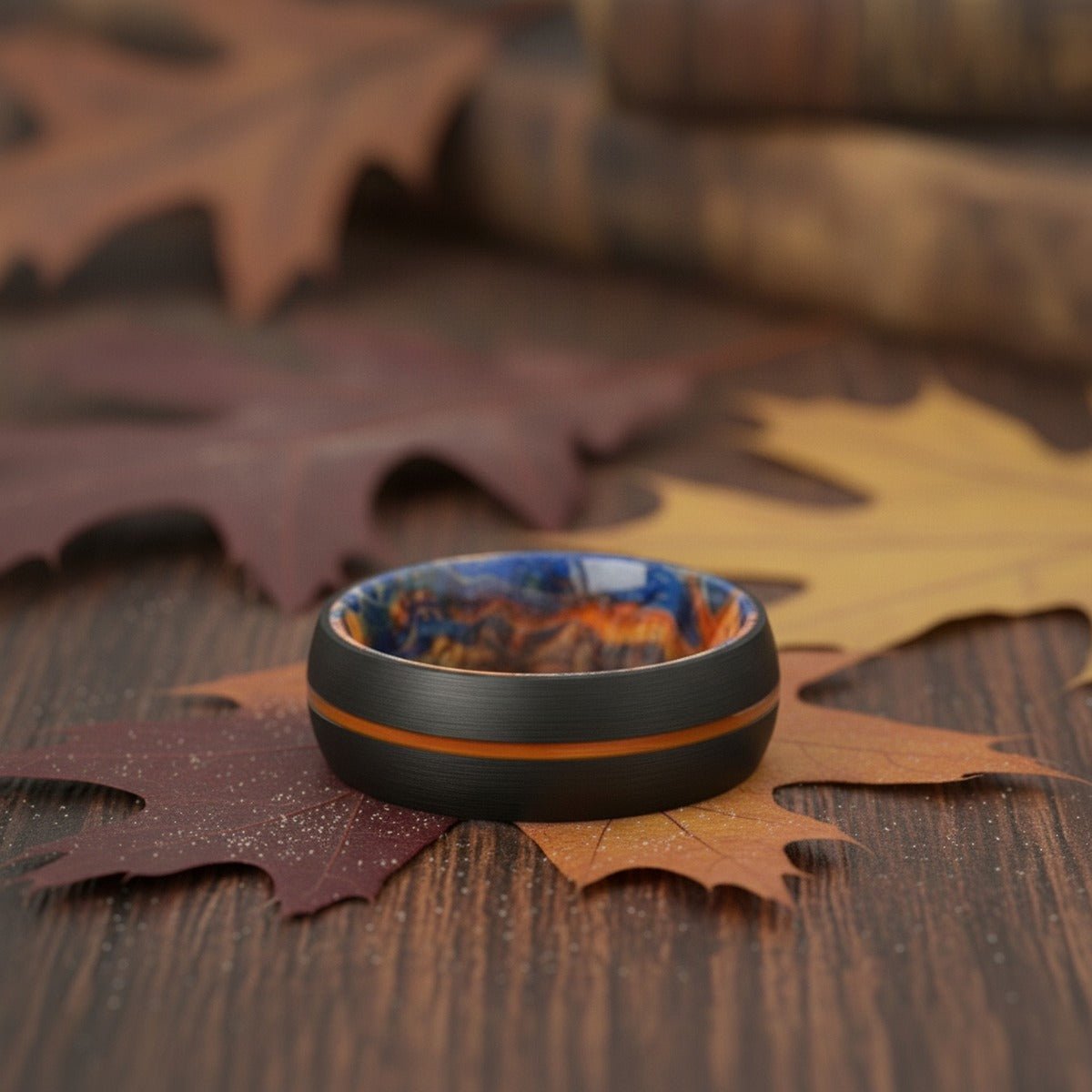 Aydins PRESTIGIOUS | Tungsten Blue Yellow Wood Inlay Ring lifestyle scene, autumn oak leaves
